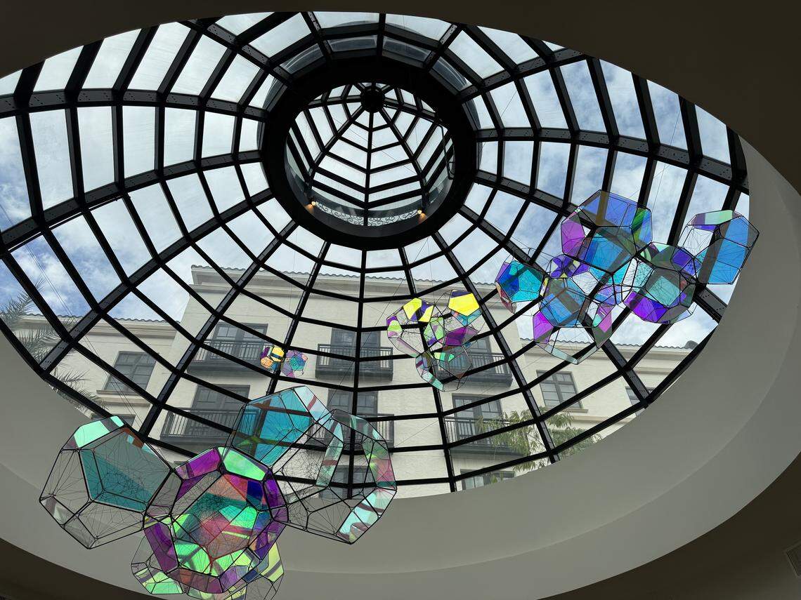 A striking glass installation inside The Alfond Inn underscores its museum-like feel.