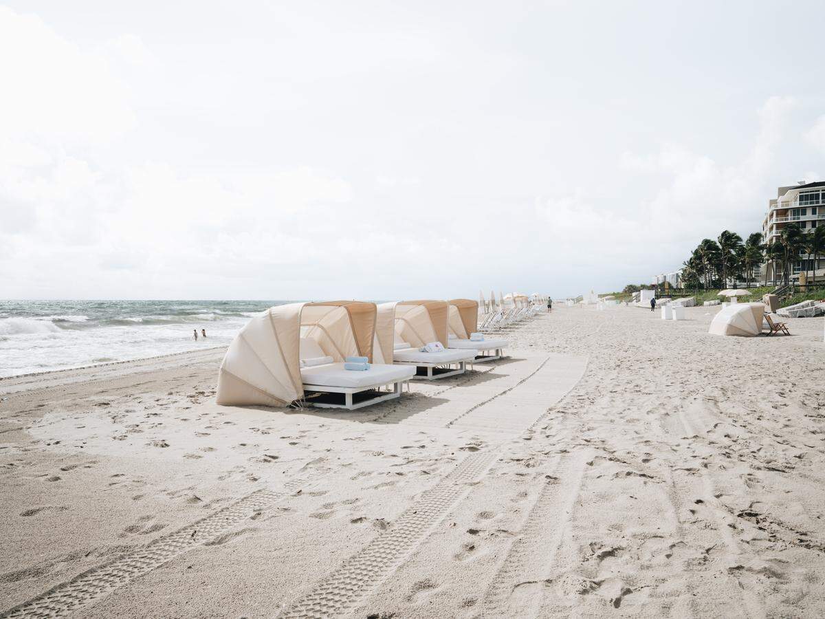 Private cabanas dot the sand at the exclusive Beach Club.
