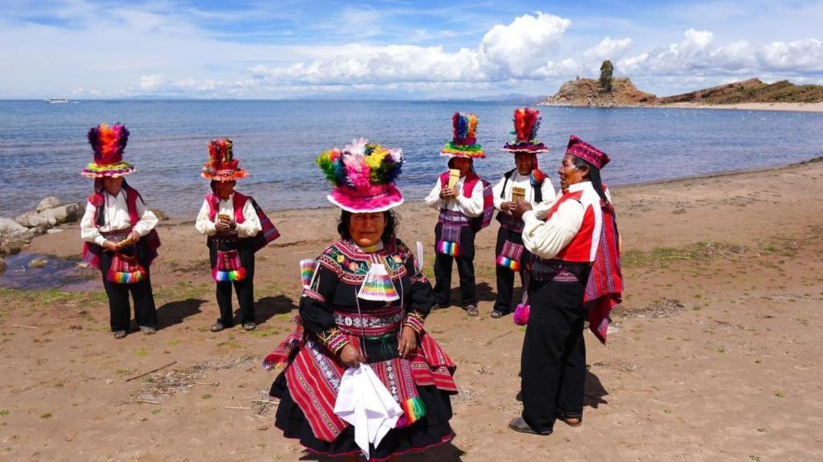 A Taquile Island welcoming committee. The inhabitants, known as Taquileños, speak Puno Quechua and are known for their fine handwoven textiles and clothing.
