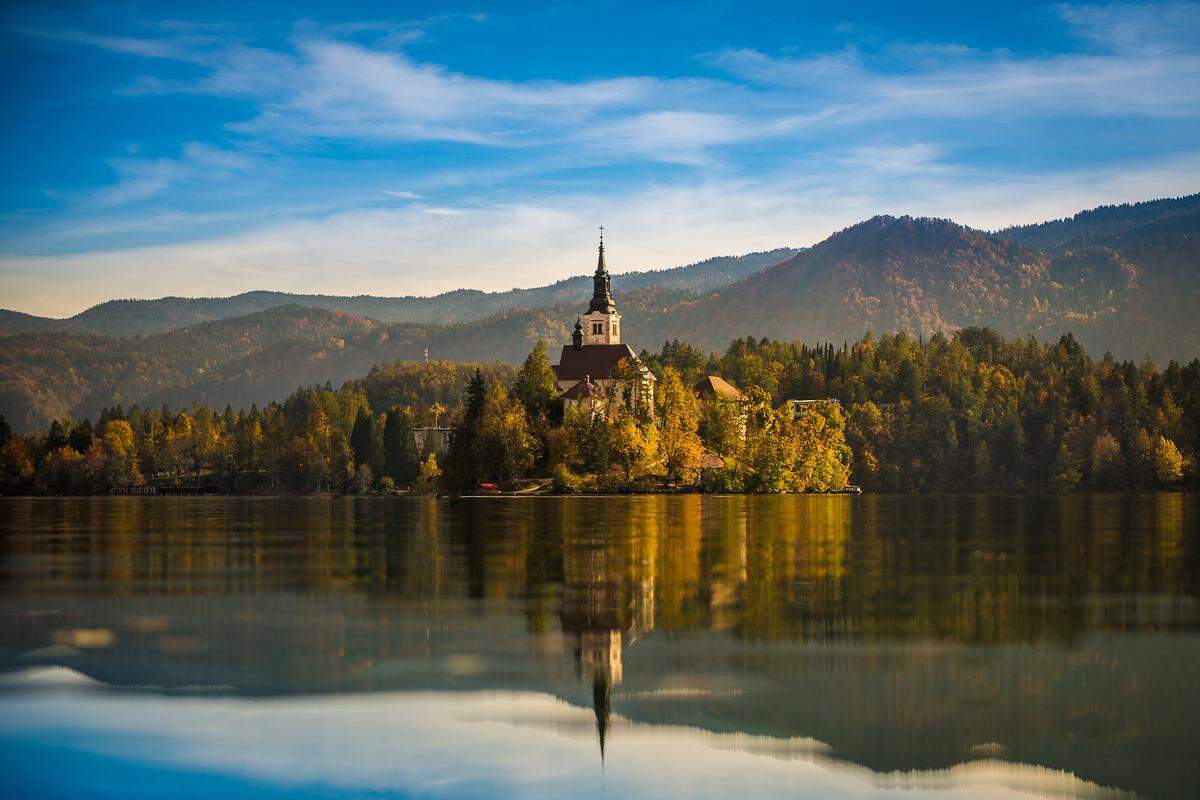 Lake Bled, Slovenia, a postcard-perfect destination known for slow travel, alpine scenery and fewer crowds than its European neighbors.