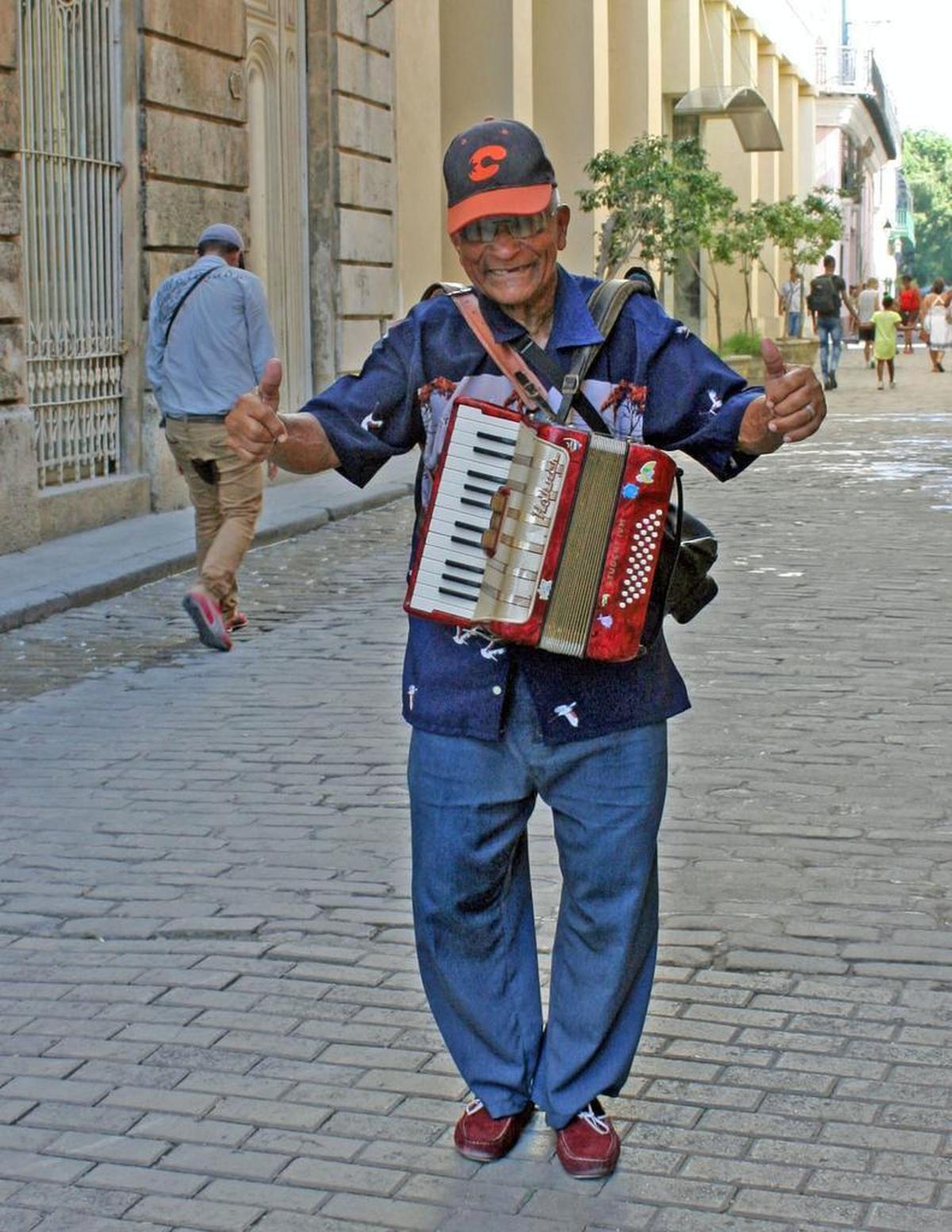 An accordionist in Old Havana sang "Guantanamera" to a tourist who said she was from the United States.