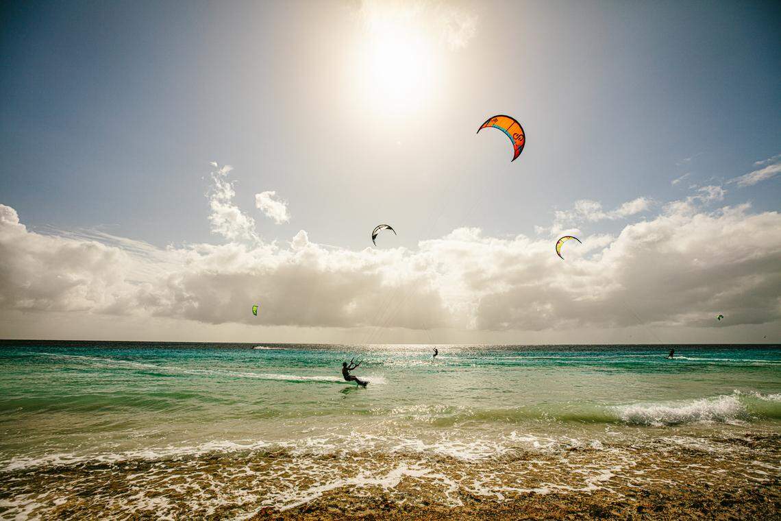 Steady trade winds and shallow waters make Bonaire a top destination for windsurfing and water sports.