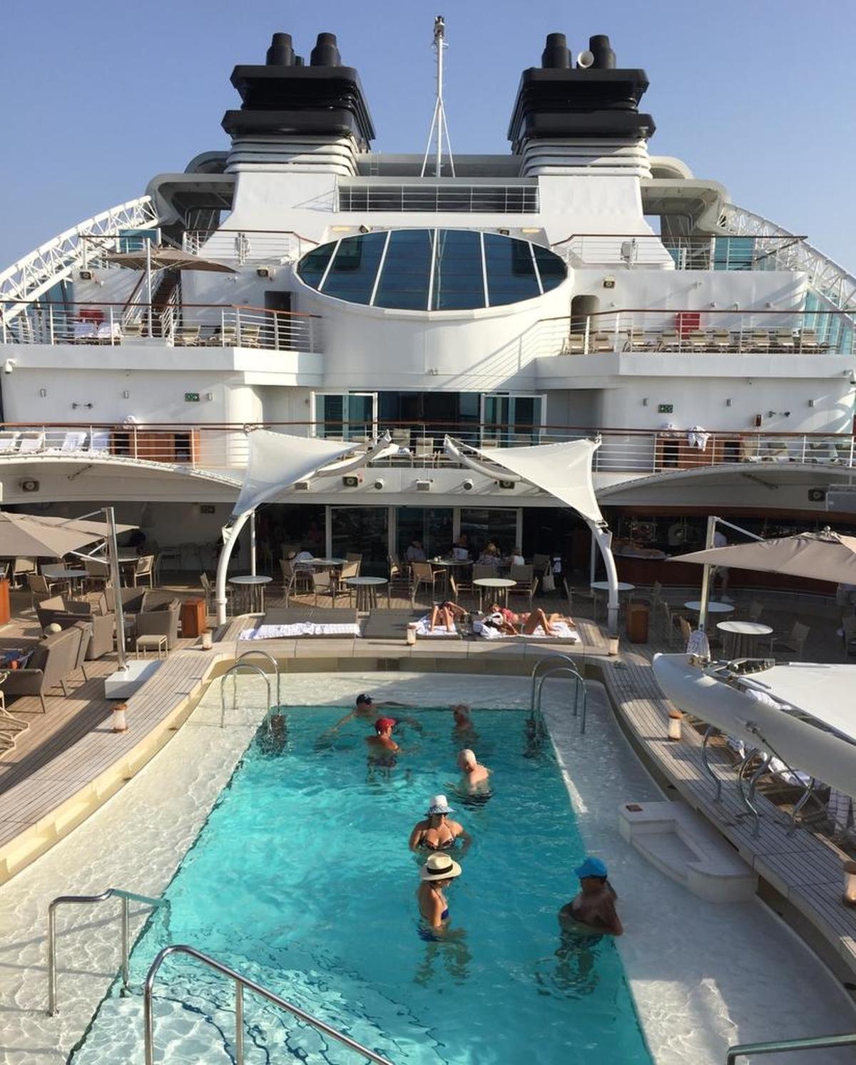 Late afternoon social gathering at the pool on Seabourn Encore