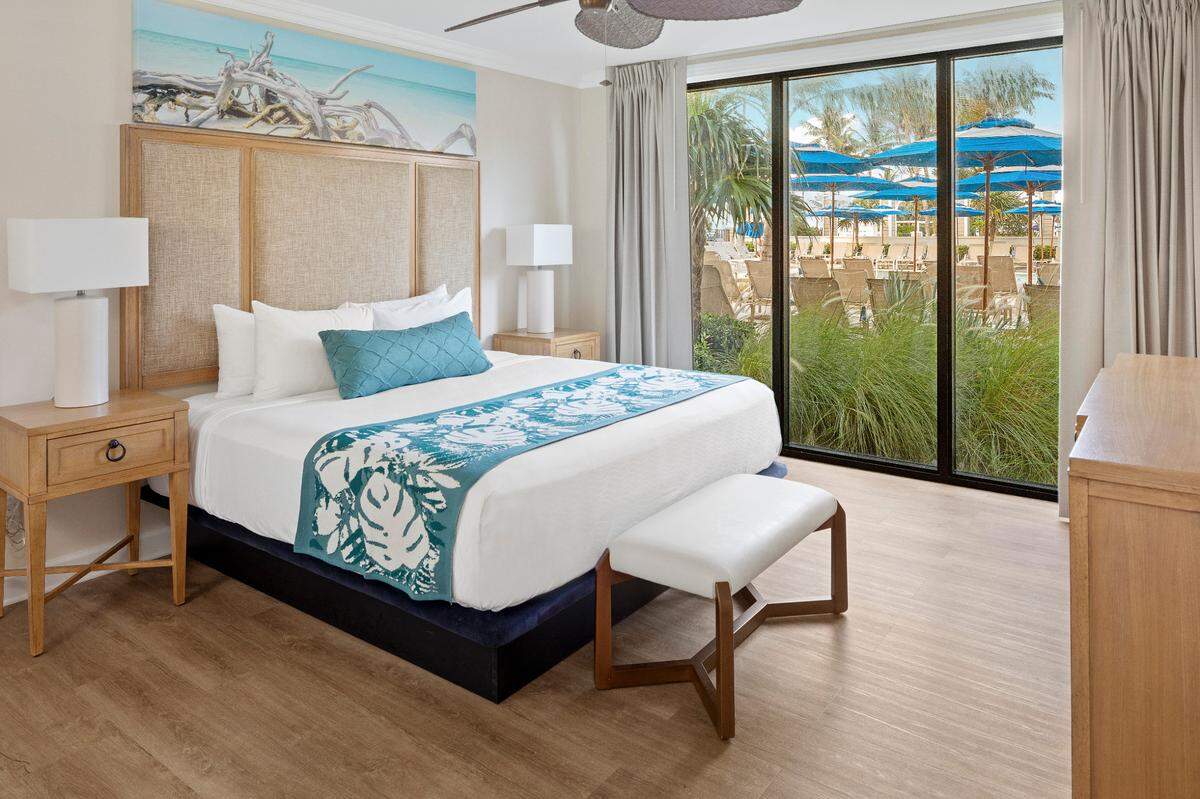 A beautiful guest room at the Opal Grand Resort & Spa.