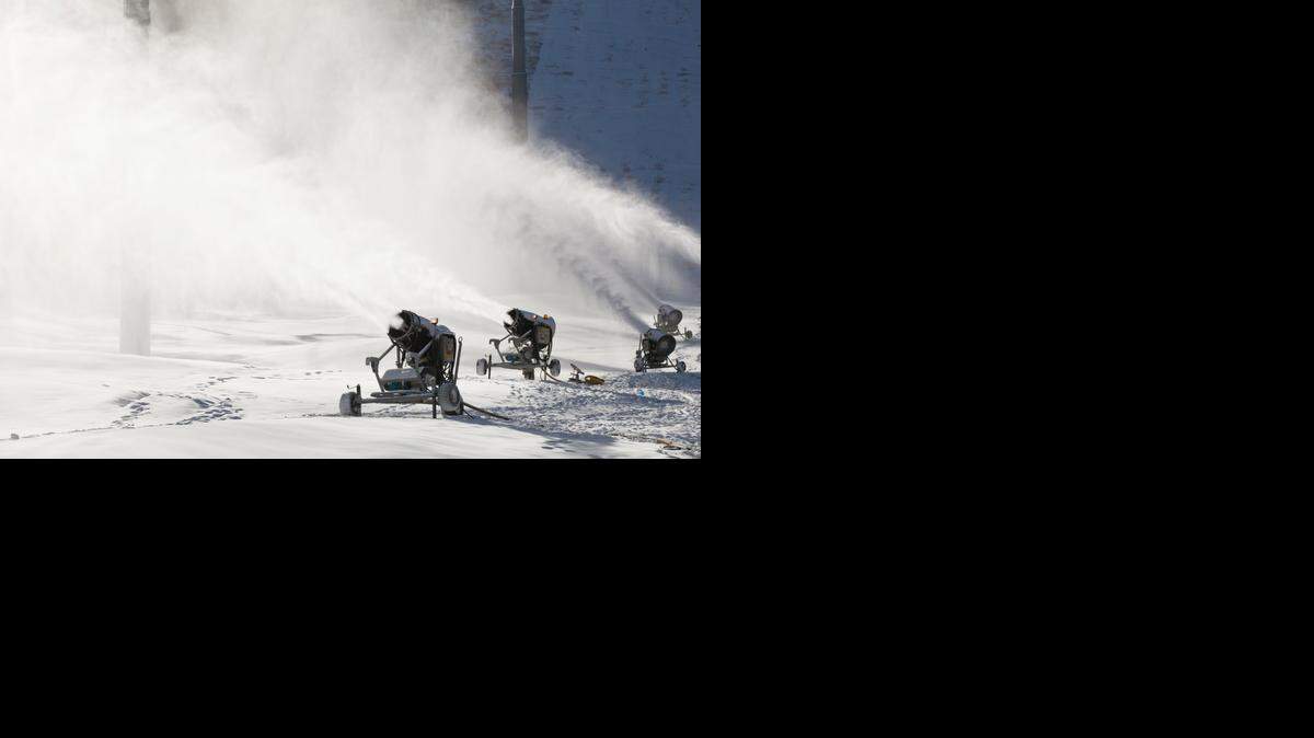 
Snowmaking guns blasting on lower Born Free at Vail Mountain.
