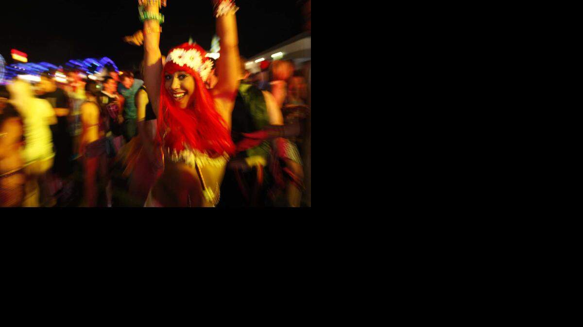 
A woman dances at the Electric Daisy Carnival in 2011
