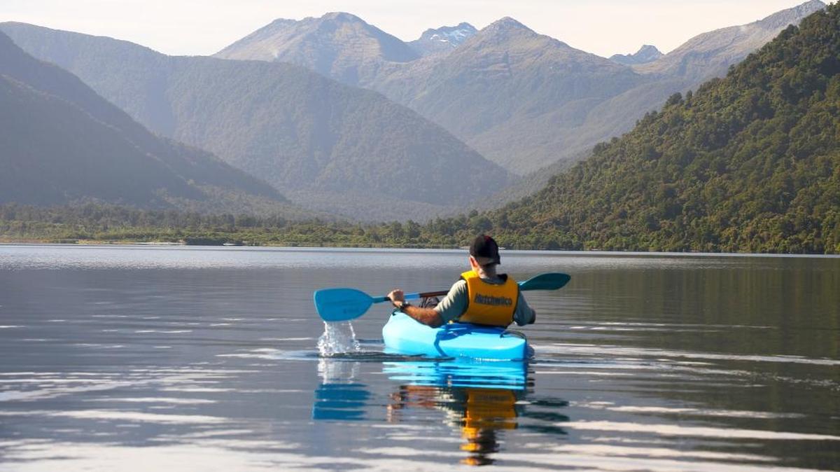 Kayaking on Lake Moeraki; the trip's standout favorite was the Wilderness Lodge Lake Moeraki, where participants took time off from cycling for other outdoor activities.
