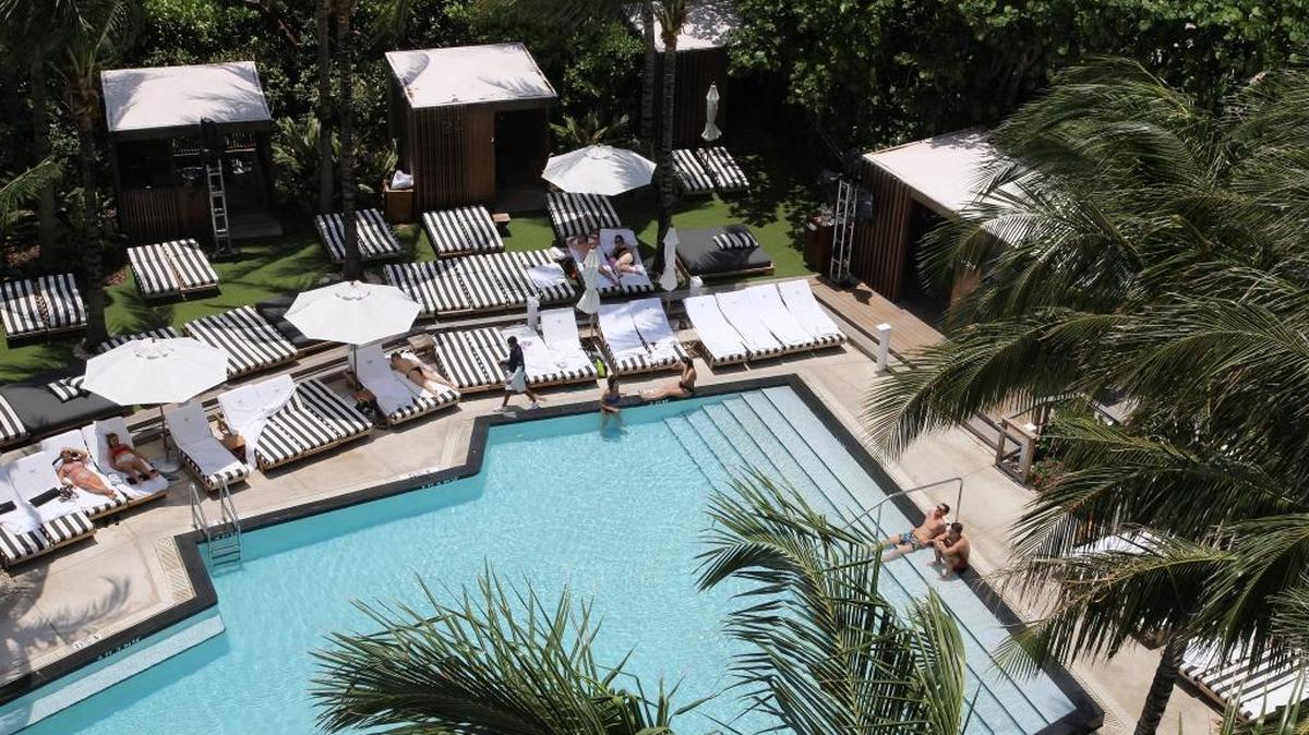 Guests of the W South Beach relax poolside.