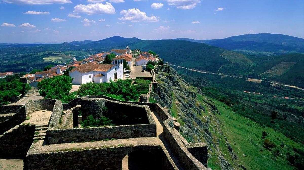 Marvao, a village of barely 150 people, sits on a dazzling rock outcrop only about 800 feet wide, 1,700 feet long and 2,800 feet above the surrounding Sever River valley.