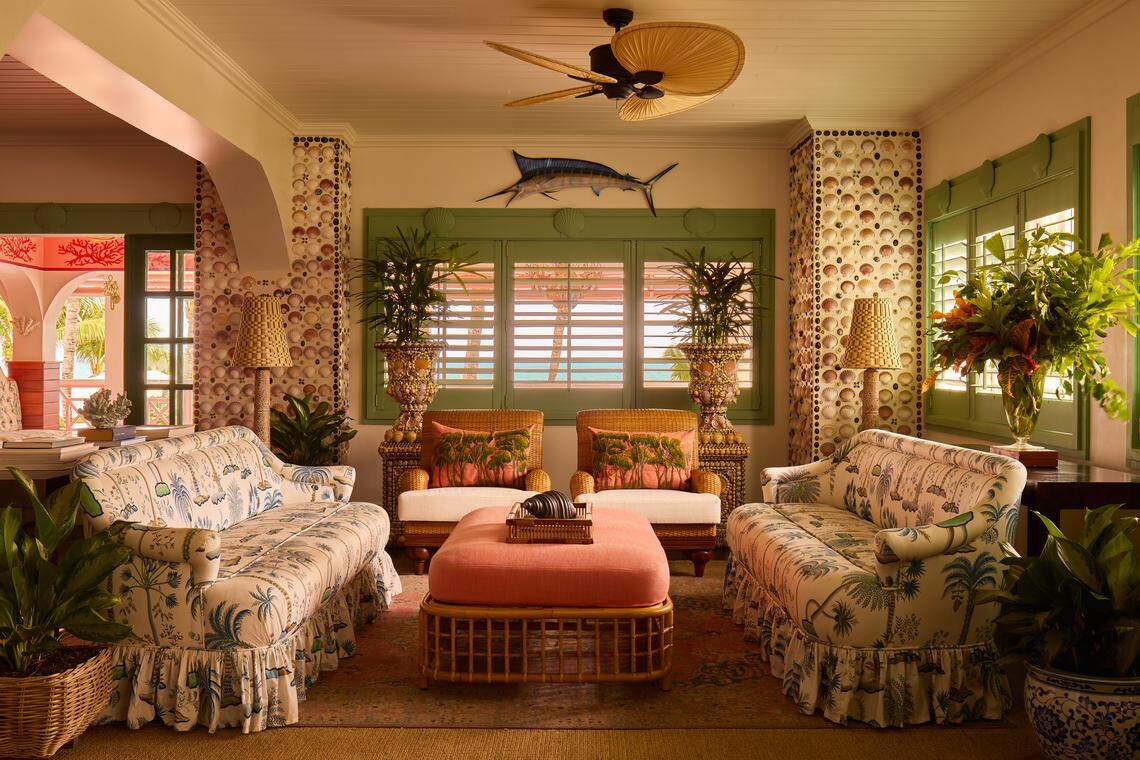 The Pink Mermaid lobby welcomes guests with whimsical details and a breezy, resort-chic aesthetic.