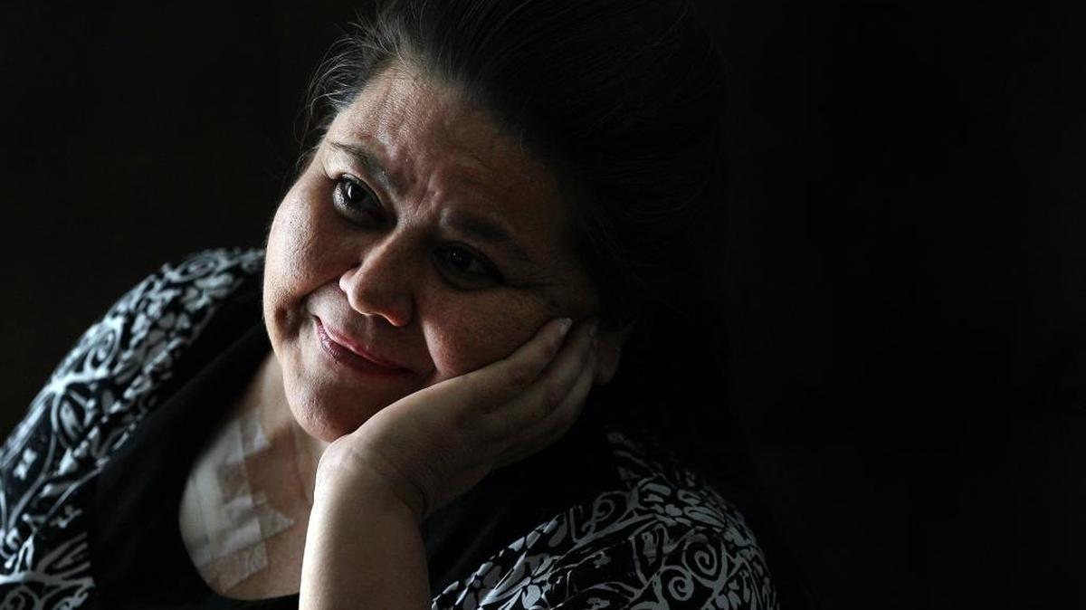 Myrtle Royce, at her Little Havana apartment on Nov. 25. Royce, who has several severe medical conditions, says a new couch and dining room set would help her quality of life.
