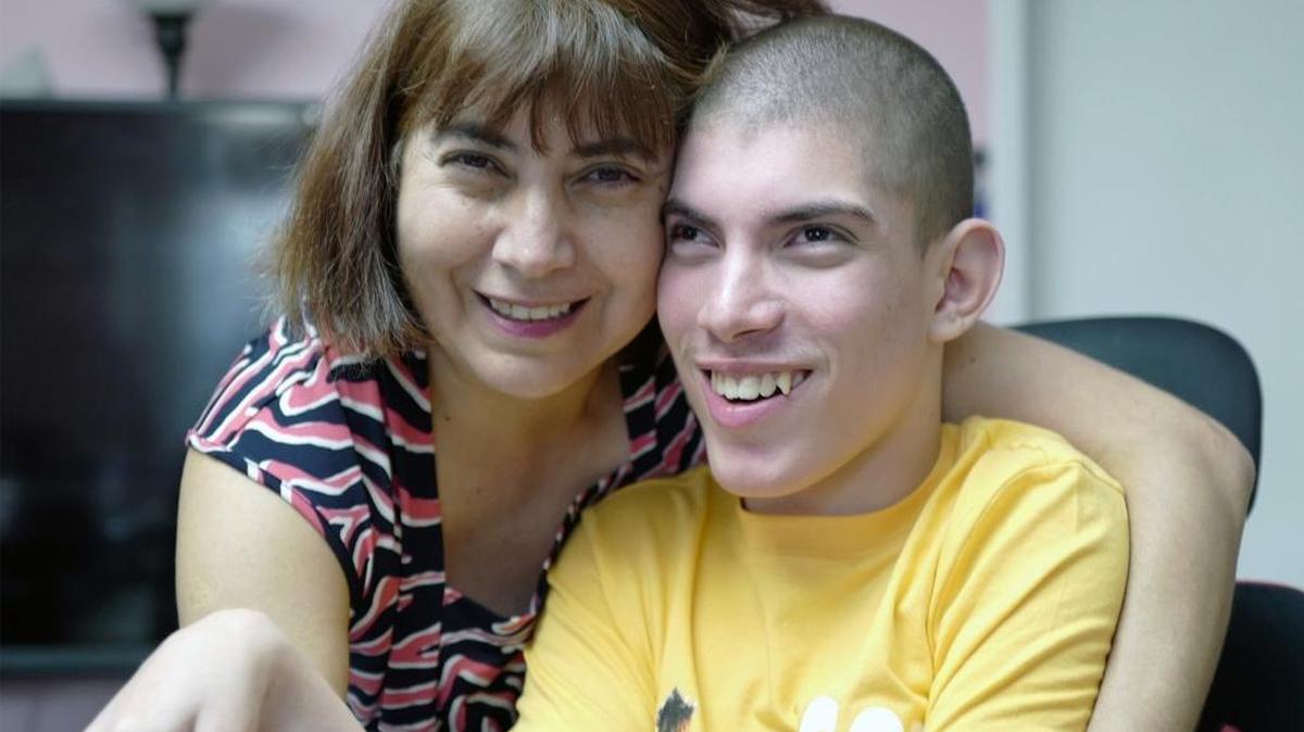 Raúl Hernández, 16, has cerebral palsy and needs a van with a ramp. Here he is with his mother, Marta Giuliani, on Nov. 14, 2017.