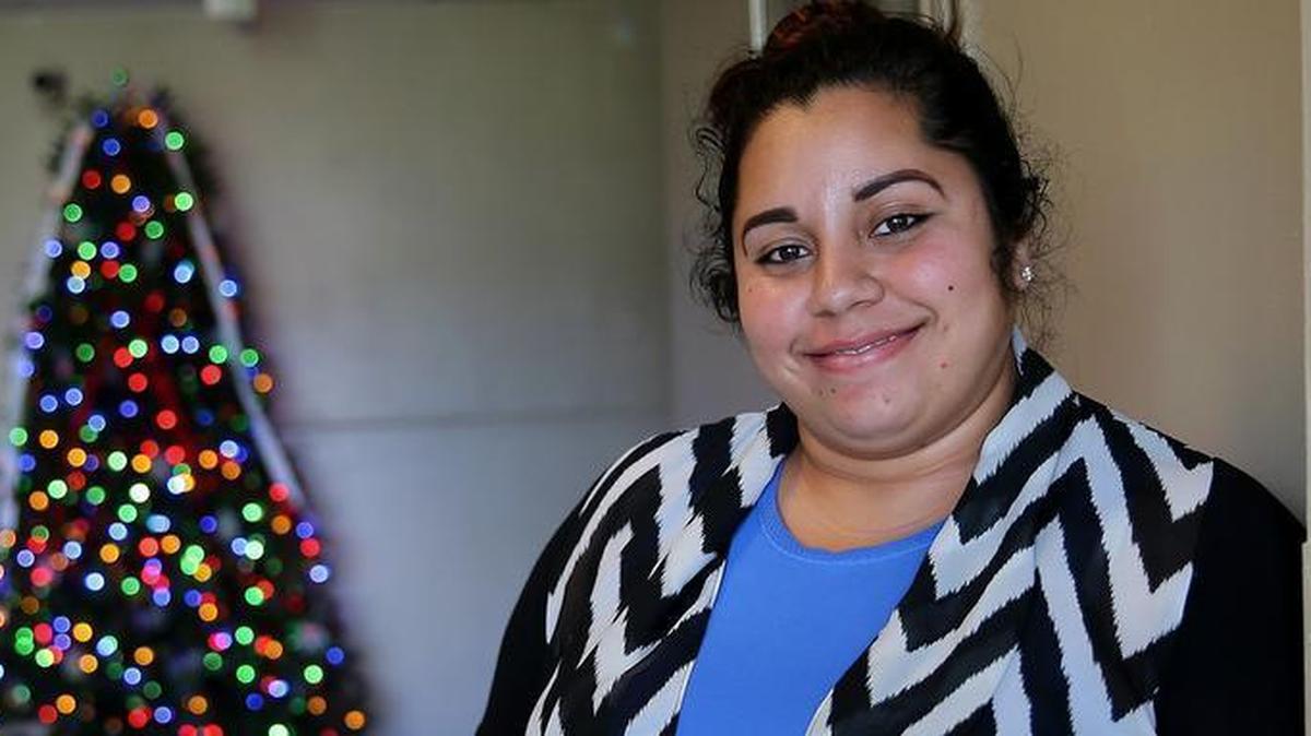 Jocelyn Altamirano, a single mother who was homeless and sleeping on the streets near Marlins Park before she went to the Miami Rescue Mission. She's found a job and is searching for low-income housing.