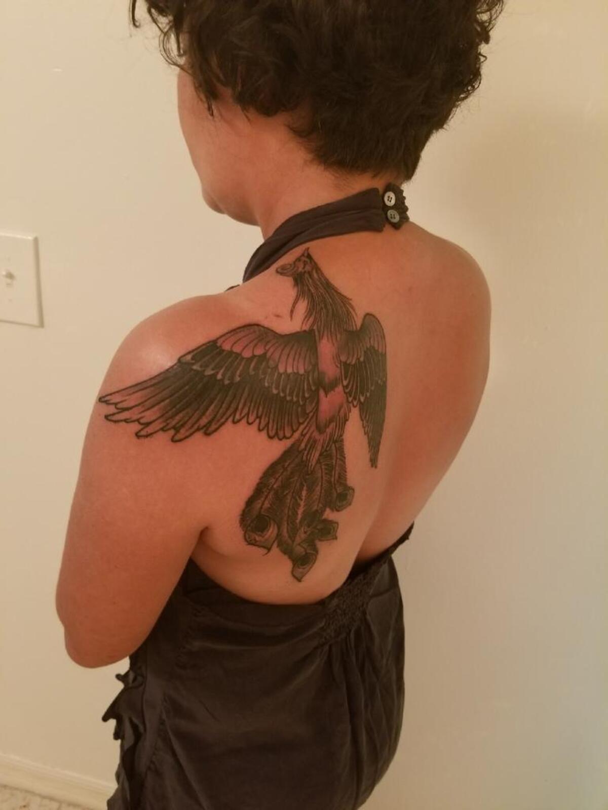 Michelle Vega, a survivor of abuse and human trafficking, had her old tattoos covered up with a phoenix, a symbol of her new beginning.