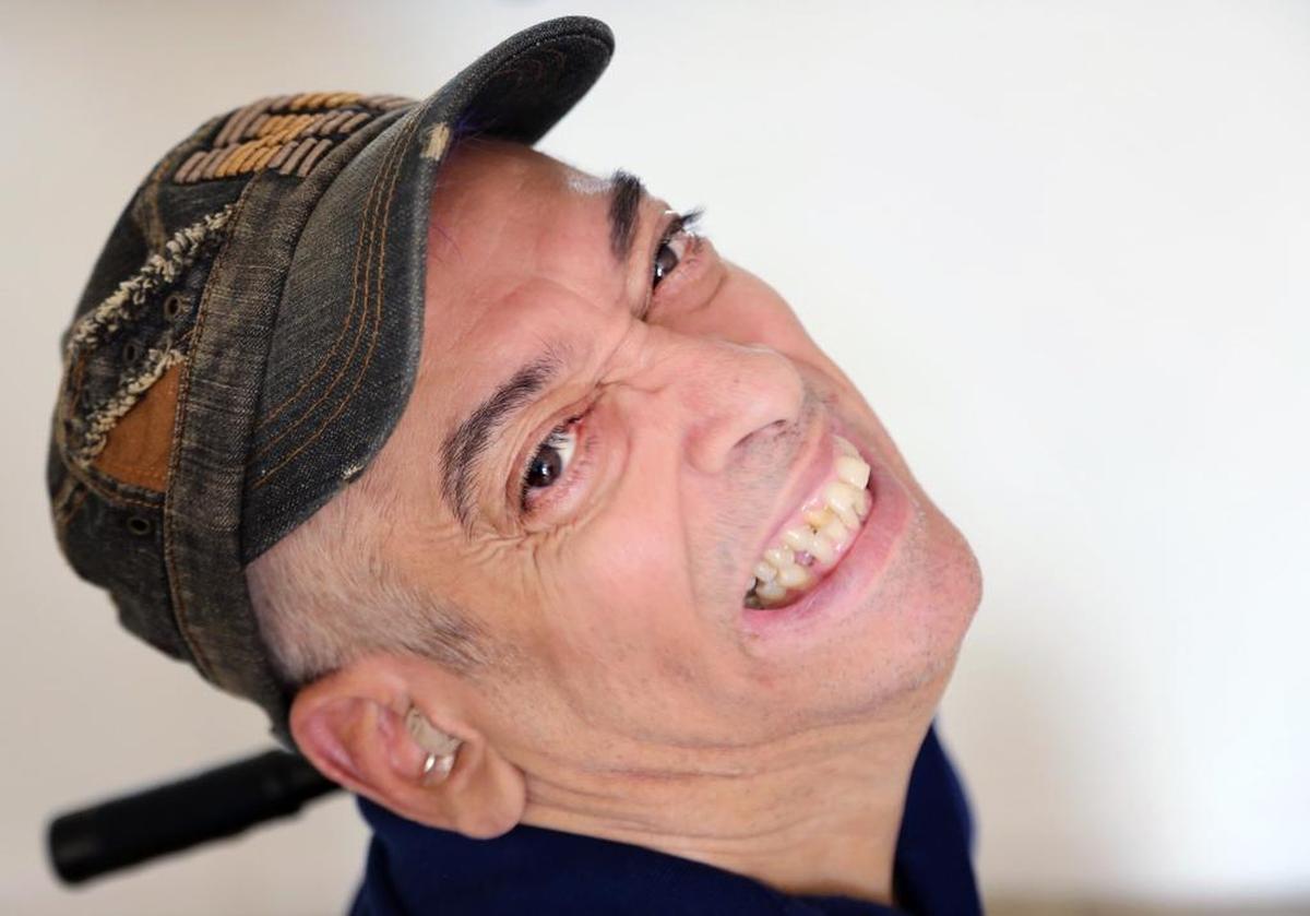 On Wednesday, Dec. 12, 2018, Emilio Alvarez, who has severe cerebral palsy, is photographed inside his modest Section 8 North Miami apartment. Alvarez once lived with 42 relatives in an 8-bedroom home, but now lives alone and is in need of dining and bedroom furniture.