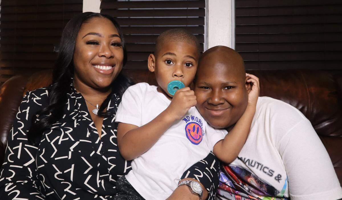 Markisa Deloach and her two sons Kaiden, center, and Jamari. “Just thinking of them keeps me going,” she says.