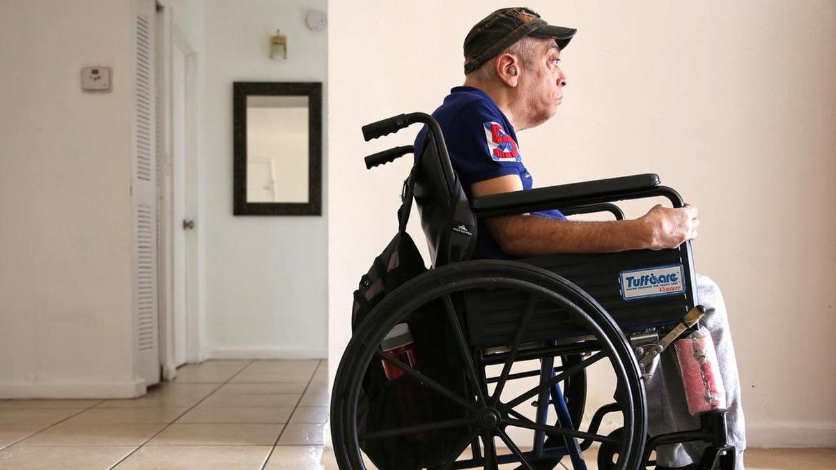 On Wednesday, Dec. 12, 2018, Emilio Alvarez, who has severe cerebral palsy, is seen in his modest Section 8 North Miami apartment.