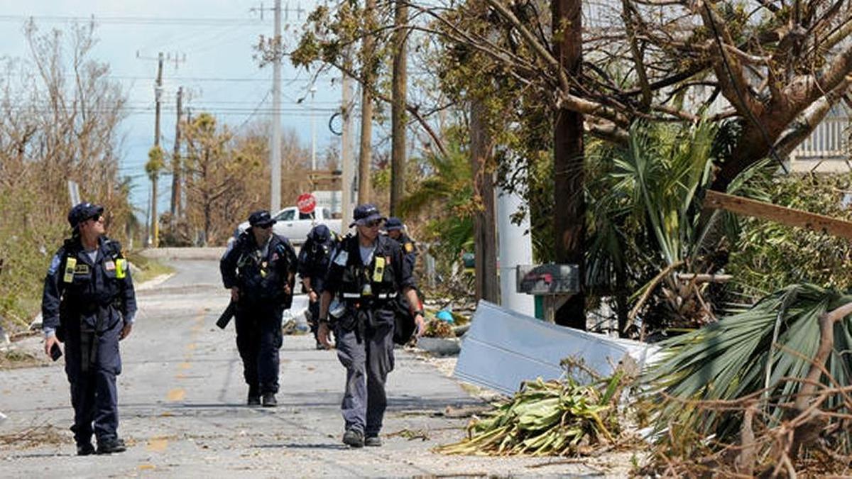LA City Fire Department FEMA California Task Force 1 go house-to-house Tuesday looking for residents in a community on Cudjoe Key, Fl. where Hurricane Irma's eye made landfall.