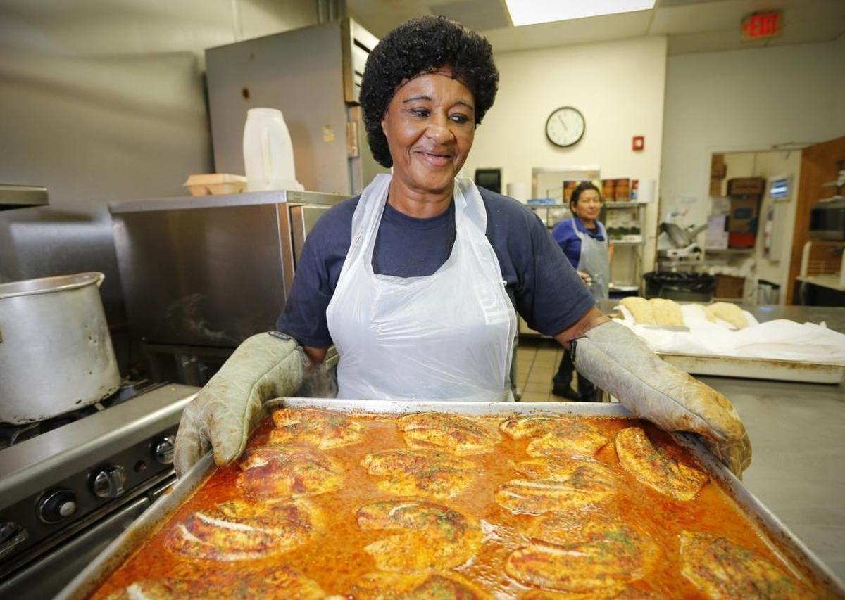 Lois Chambers, who has been the lead cook for Goodwill for the past 18 years, can’t afford dentures and her insurance won’t cover them. Her peers nominated her for Miami Herald’s Wishbook program because they want to see her smile again. This is Chambers in the kitchen at Goodwill on Thursday, November 17, 2016