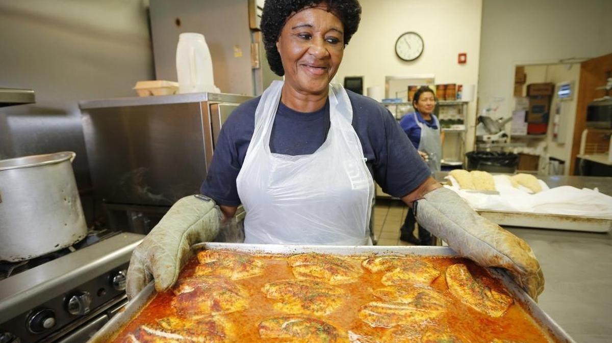 Lois Chambers, who has been the lead cook for Goodwill for the past 18 years, can't afford dentures and her insurance won't cover them. Her peers nominated her for Miami Herald's Wishbook program because they want to see her smile again. This is Chambers in the kitchen at Goodwill on Thursday, November 17, 2016