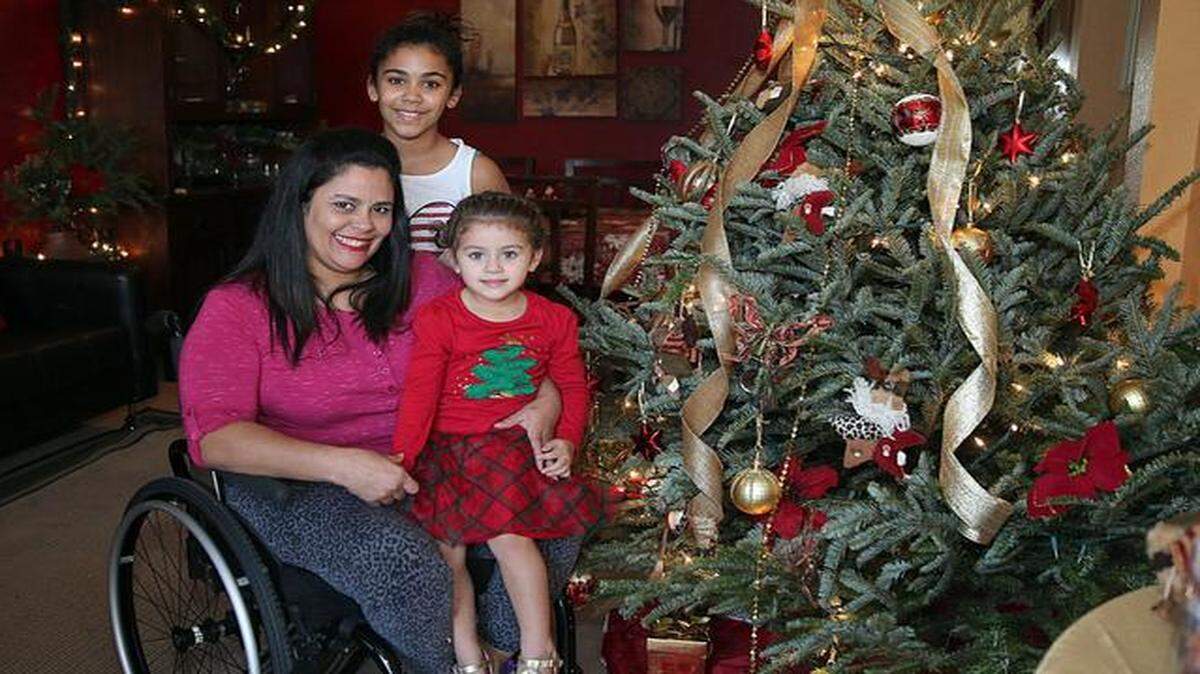 
Leslie Miranda with her daughters Gabriela, 11, and Mia, 3, in her home in Miami.


