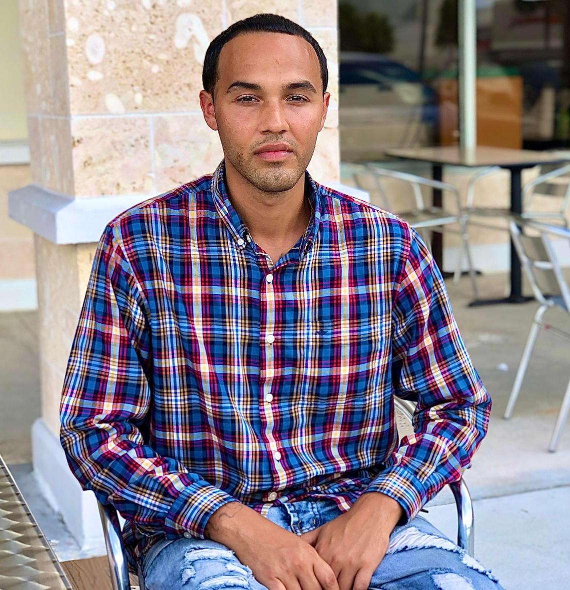 Michael Torres, shown here at the Outrageous Bagel Co. in Kendall on Oct. 30, lives at Here’s Help in Opa-locka, a program for people dealing with substance abuse. 