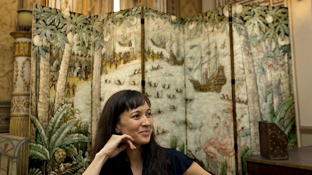 COMBO CUT WILL BE HERE Gina Wouters, curator at Vizcaya in front of a screen by artist Robert Winthrop Chanler, an early 20th Century American painter. Wouters is a contributor to a new book about Robert Winthrop Chanler's life and his work. Vizcaya is featured prominently in the book, where Chanler's fantastic undersea mural remains on the ceiling over the pool.