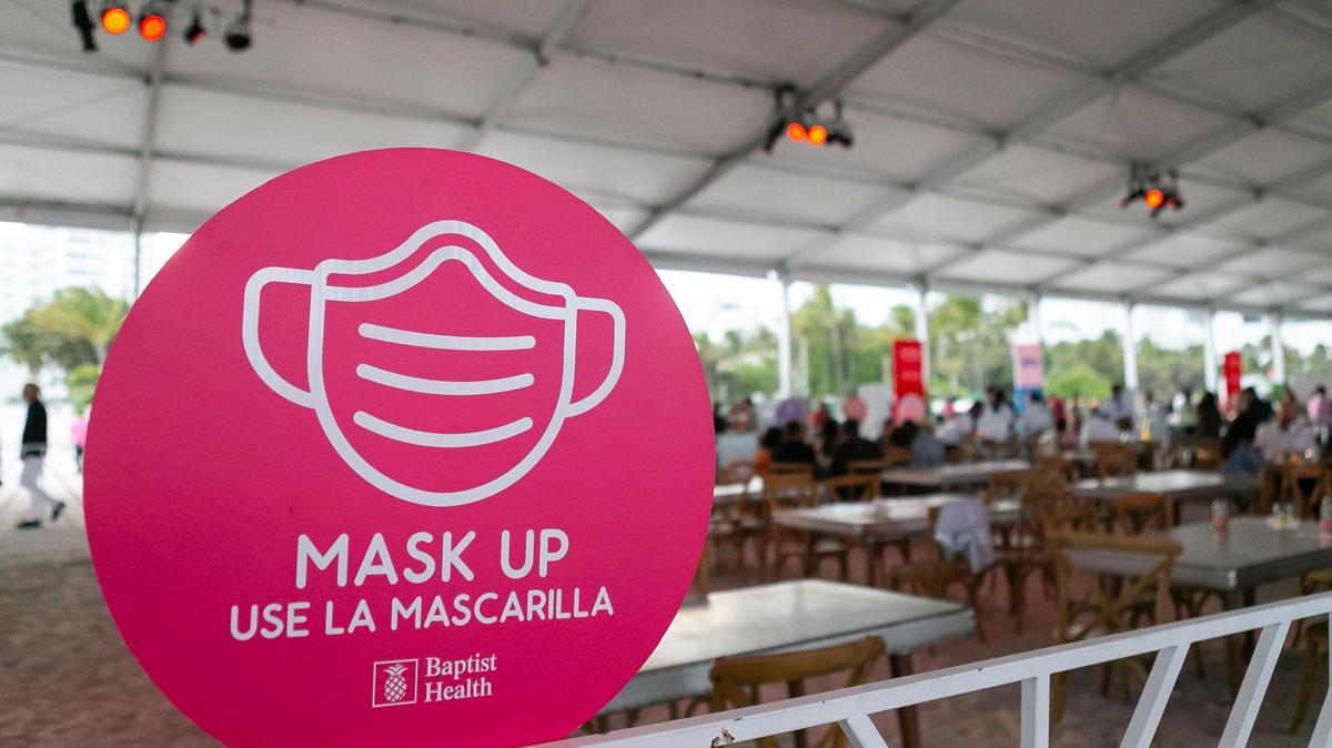 COVID-19 safety protocol signage was on display during the South Beach Wine and Food Festival Italian Bites on the Beach kickoff event in Miami Beach, Florida on Thursday, May 20, 2021.