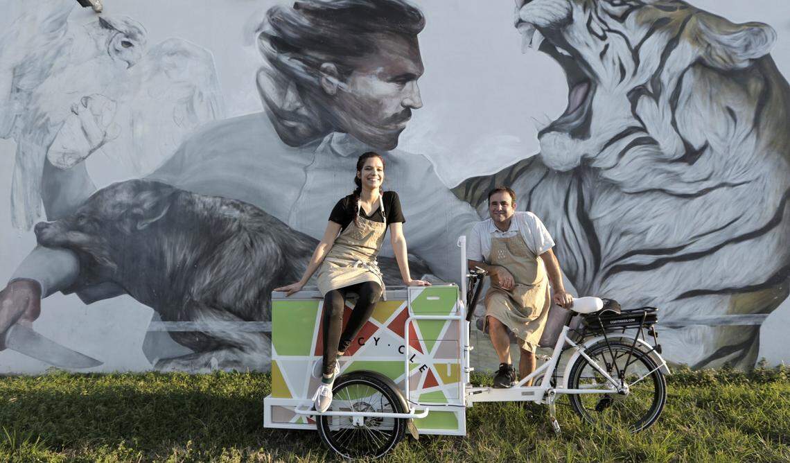 Miami, Florida, September 20, 2018 - Devin Braddock and Danny Serfer with their Tricycle in front of a mural in Wynwood.Remember when ice cream used to be fun, kids running after the ice cream truck with their parents' cash in hand? That's the nostalgia chefs Danny Serfer and his pastry chef at Blue Collar and Mignonette, Devin Braddock, have tried to replicate with Tricycle. They outfitted a motorized ice cream car that they ride to its current location in Wynwood (at a brisk 12 mph), selling homemade ice creams. They make Choco tacos, classic drumsticks, ice cram bars, and even a giant rainbow cake with the whole ROYGBIV rainbow. It's made-for-Instagram beautiful - and also delicious.