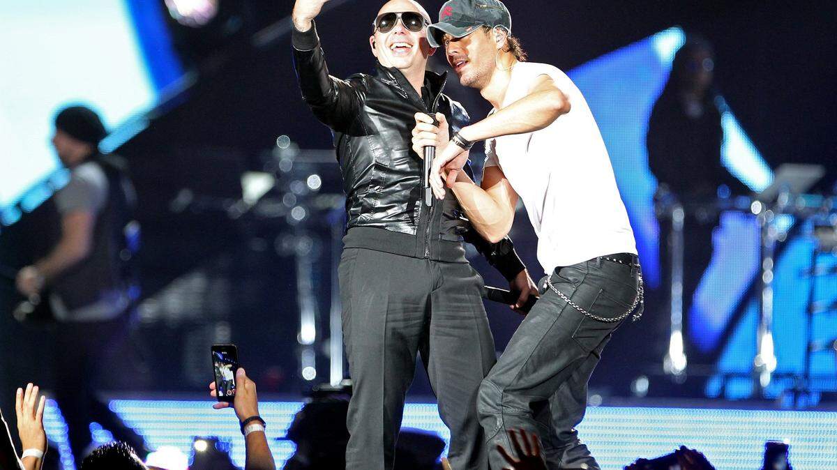 Pitbull y Enrique Iglesias durante su concierto en la American Airlines Arena de Miami, el 26 de octubre de 2014. Ambos se presentan este fin de semana en la American Airline Arena.