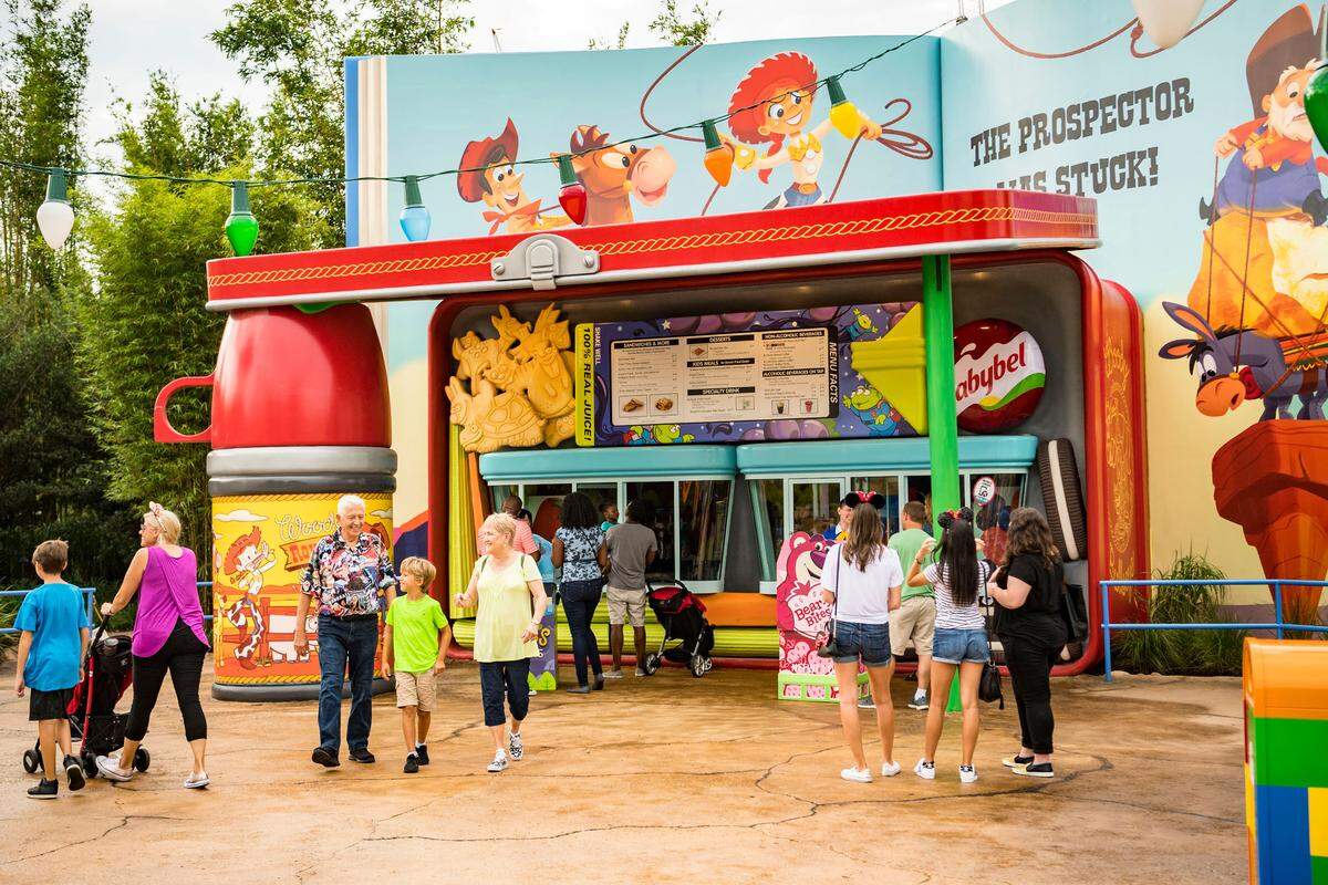 Woody's Lunch Box is a quick-service food and beverage location serving tasty meals and old-fashioned soda floats in Toy Story Land at Disney's Hollywood Studios. The walk-up window Ð open for breakfast, lunch and dinner Ð dishes up all sorts of sandwiches and sides that put a spin on classic recipes. Walt Disney World Resort collaborated with Mini Babybel to bring WoodyÕs Lunch Box to life. Inside the 11-acre Toy Story Land, guests can whoosh along on the family-friendly roller coaster, Slinky Dog Dash, take a spin aboard Alien Swirling Saucers and try for the high score on Toy Story Mania! (Matt Stroshane, photographer)