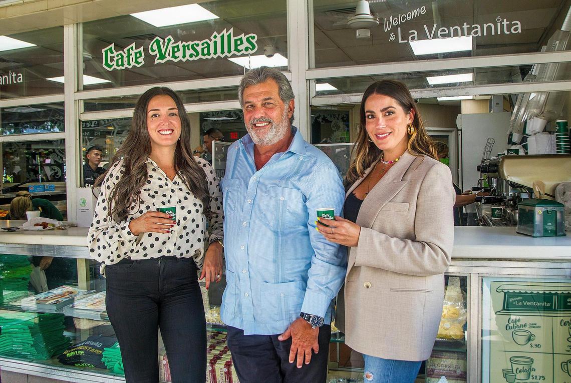 Nicole and Luly Valls, the third generation of the Valls family to run Versailles, with their father, Felipe Valls Jr., at the restaurant’s ventanita, where clients can have a coffee and a chat.