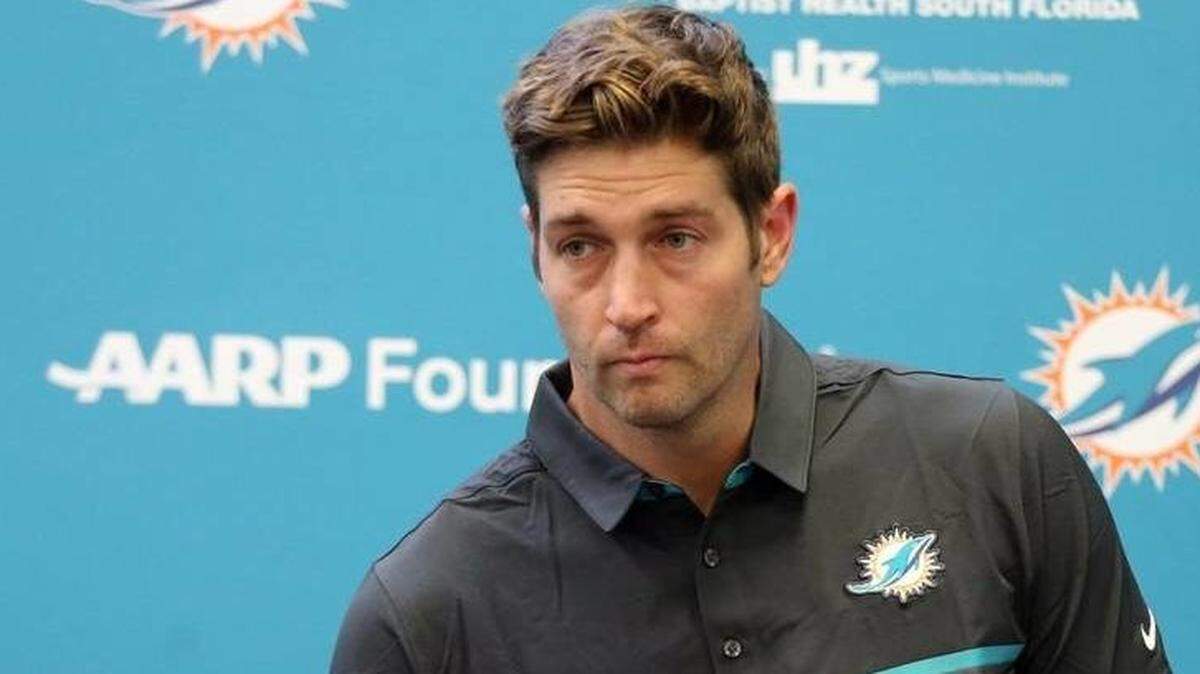 Quarterback Jay Cutler talks to the media at the Miami Dolphins training facility in Davie. He does not look enthused.