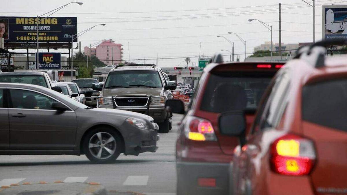 Two cars make to wait a left hand turn on Northwest 27th Avenue and Seventh Street on Saturday, June 3, 2017. The Chevy Blazer on the other side also wait to turn across the intersection without their turn signal on.