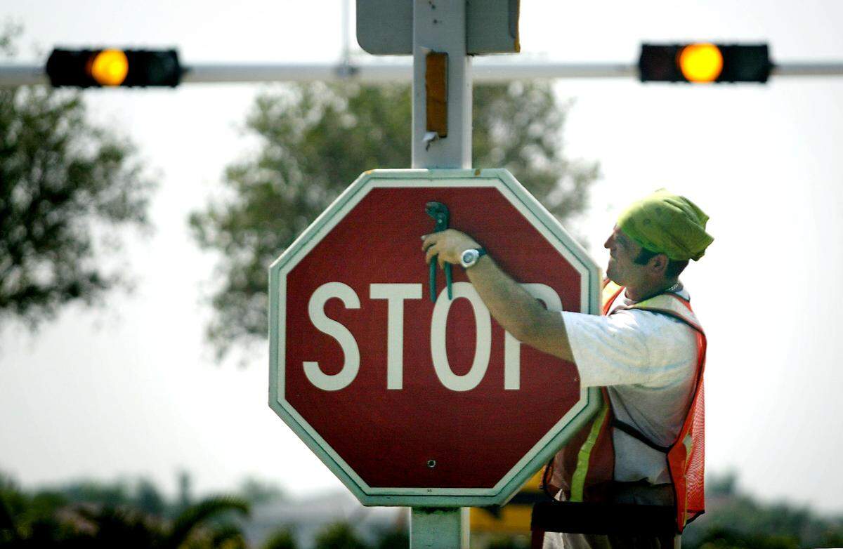 Stop signs can’t hold back Miami drivers. J. Albert Diaz/ Miami Herald Staff