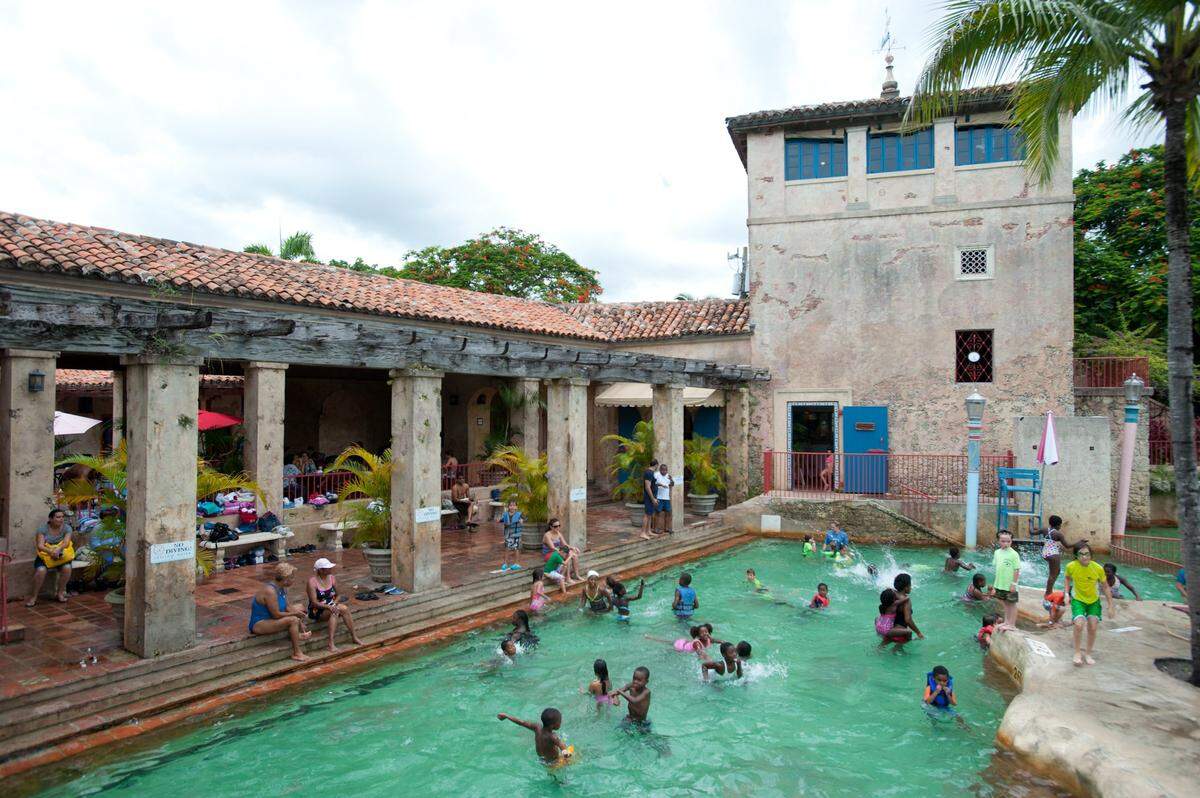 Visitors play at Venetian Pool in Coral Gables, Friday, Aug. 2, 2013. The pool is located at 2701 de Soto Boulevard.