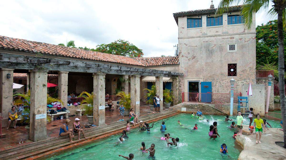 Visitors play at Venetian Pool in Coral Gables, Friday, Aug. 2, 2013. The pool is located at 2701 de Soto Boulevard.