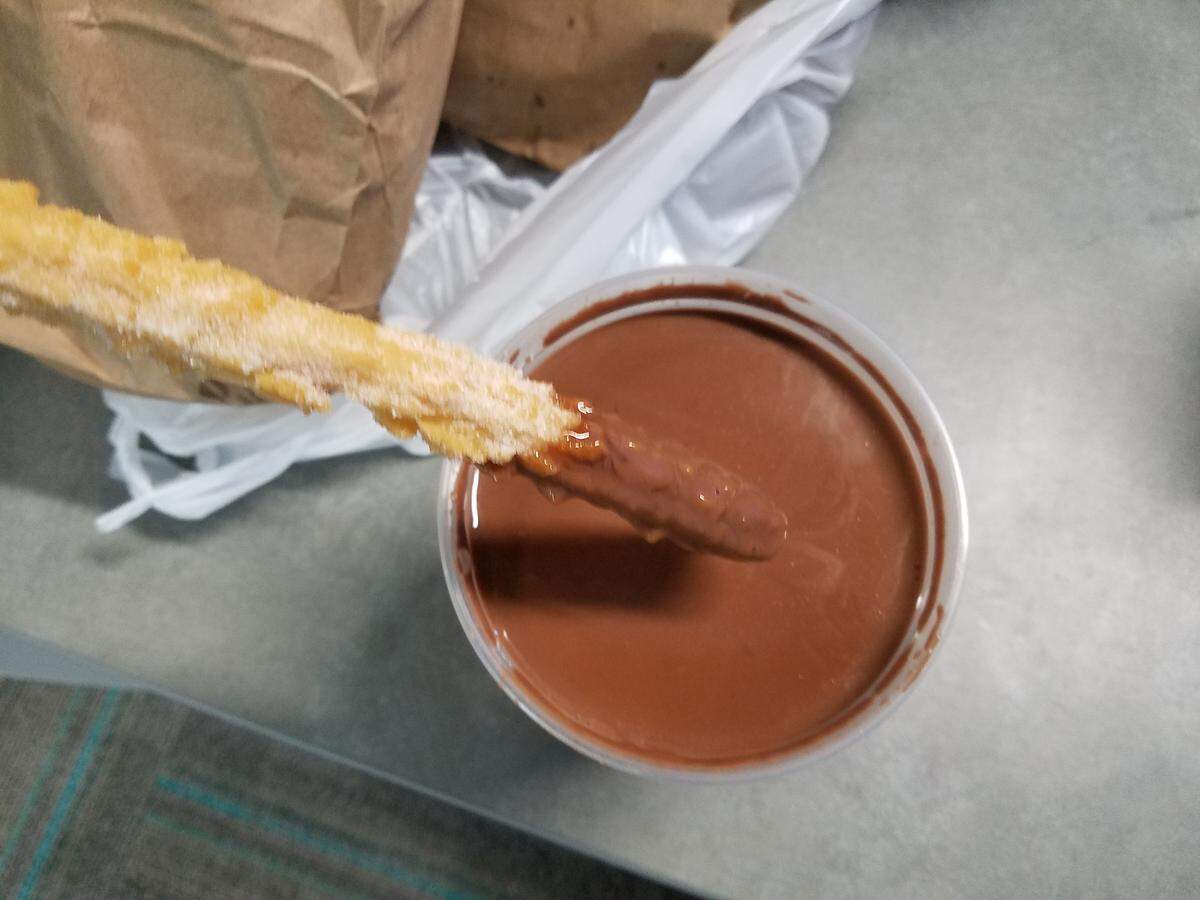 Fried sugary dough and thick hot dipping chocolate, how I will miss you until the next cold snap.