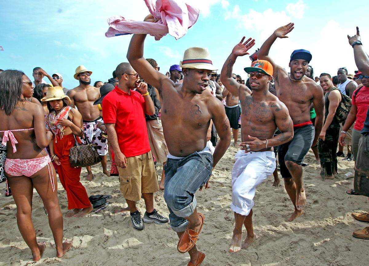 John Hunt, 24, of North Carolina A&amp;T dances with friends on South Beach. From North Carolina, to Indiana, and points in between, college students are flocking to South Florida on Friday, March 9, 2012 to celebrate that fun-in-the-sun, coming-of-age ritual known as spring break. Neither high gas prices, rising airfares nor a relatively mild winter in the Northeast and Midwest seems to be proving a deterrent to drawing revelers, industry experts say. In fact, the throngs are expected to arrive in earnest next week, with the hedonistic celebration stretching out for the remainder of March, as different colleges break for vacation.