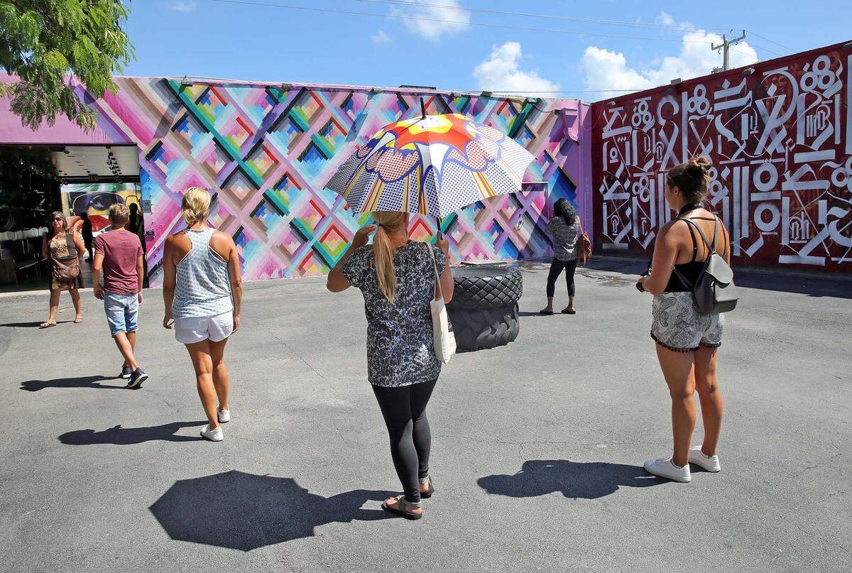 Tourist visit Wynwood Walls on Tuesday August 23, 2016 even though Governor Rick Scott announced today that four new cases of Zika were discovered in Wynwood today.
