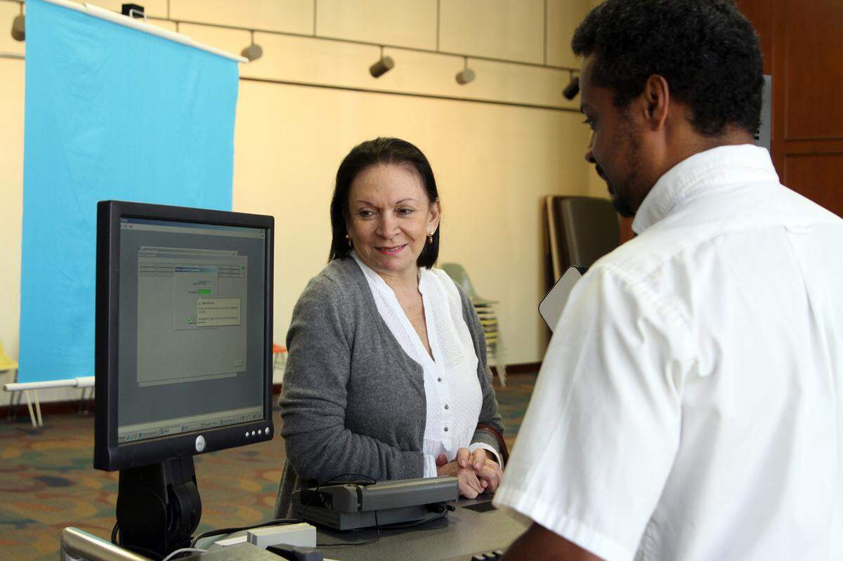 She’s smiling, but all Miami drivers hate trips to the DMV.