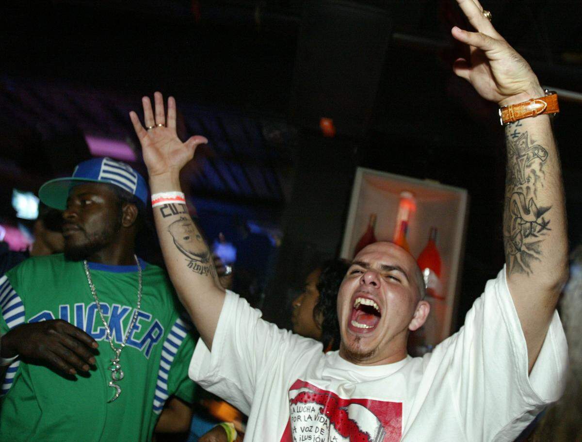 TO DADE--05/28/04--RAUL RUBIERA Miami Beach -- Florida Trick Daddy (on the left) parties with rapper Pitbull at Club Deep.