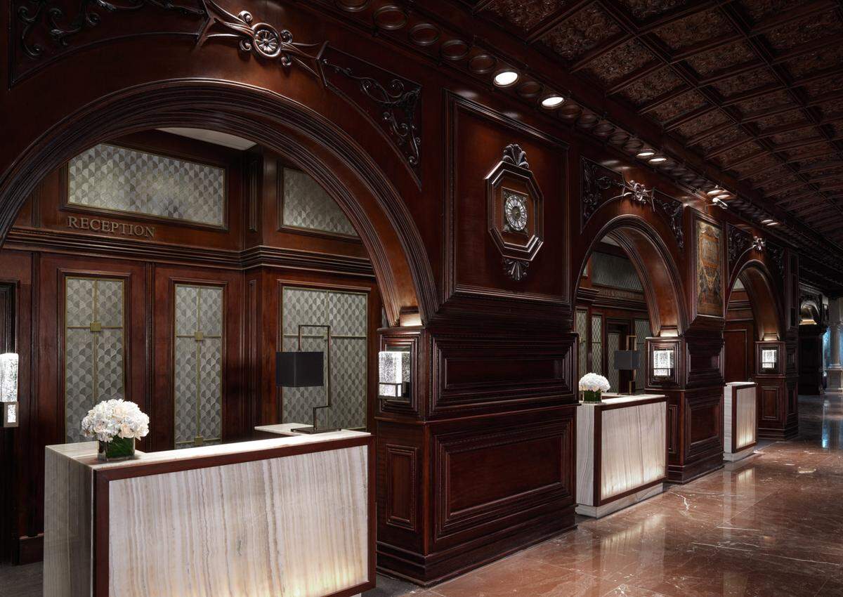 Check in at El San Juan hotel.