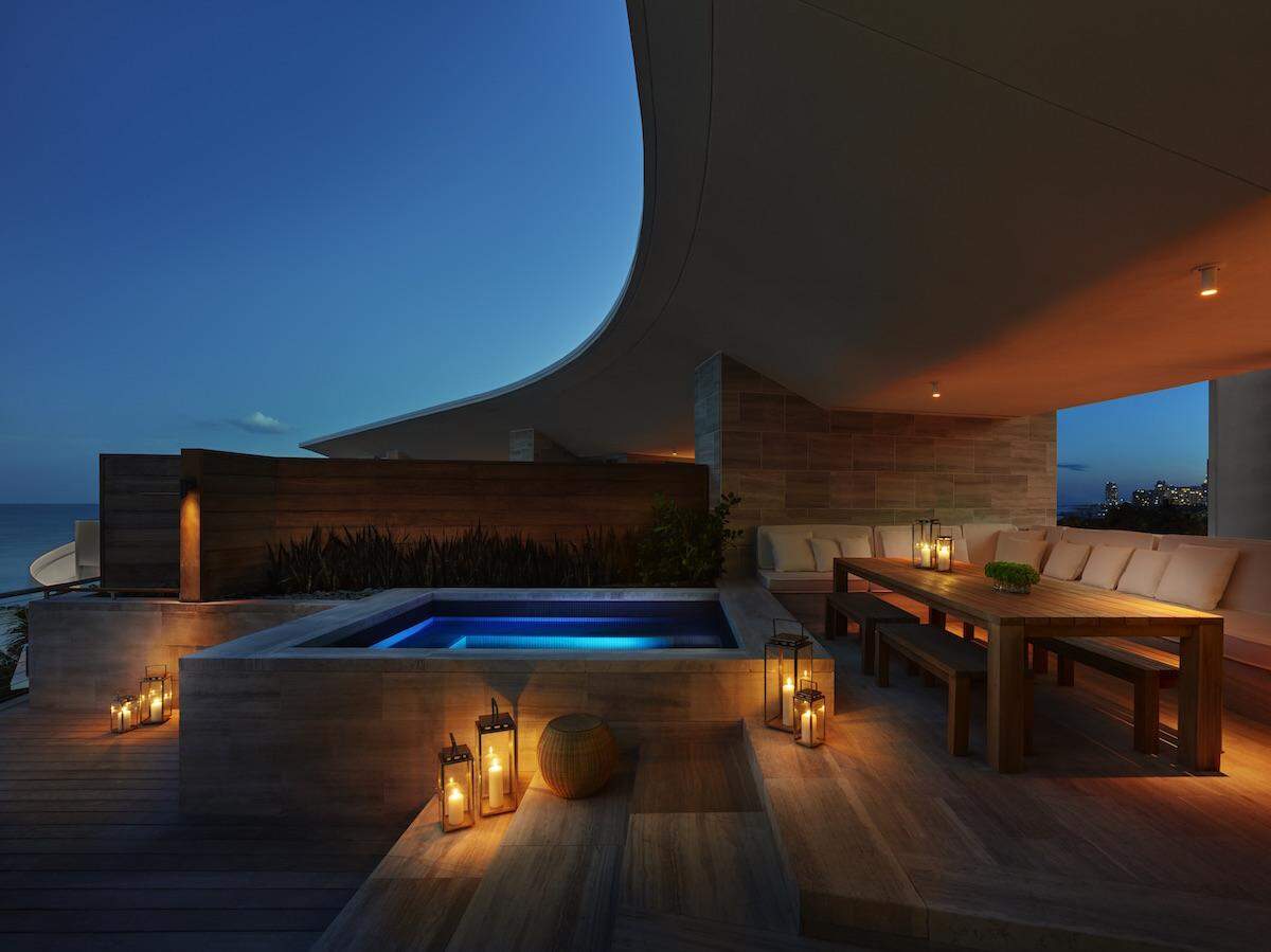 Dusk on the private terrace of a penthouse bungalow at The EDITION.