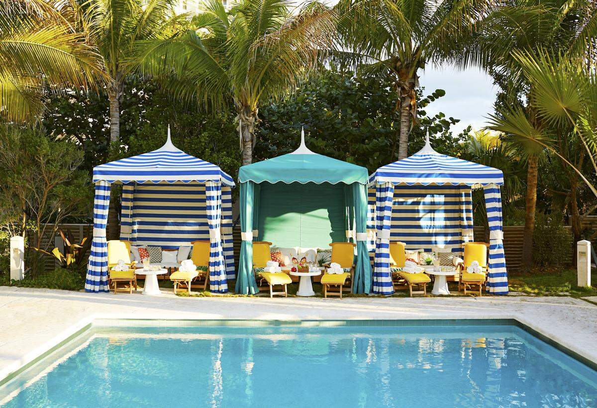A trio of colorful cabanas line the pool at The Confidante. Photo by Chris Sanders.
