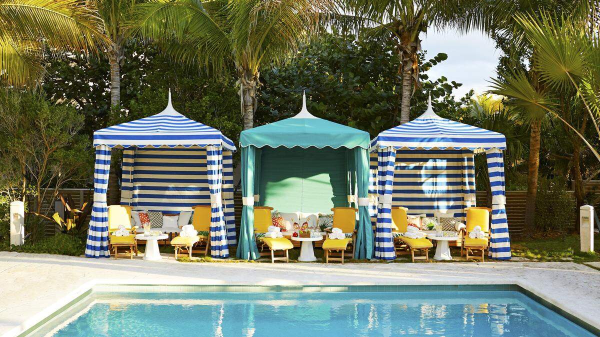 A trio of colorful cabanas line the pool at The Confidante. Photo by Chris Sanders.