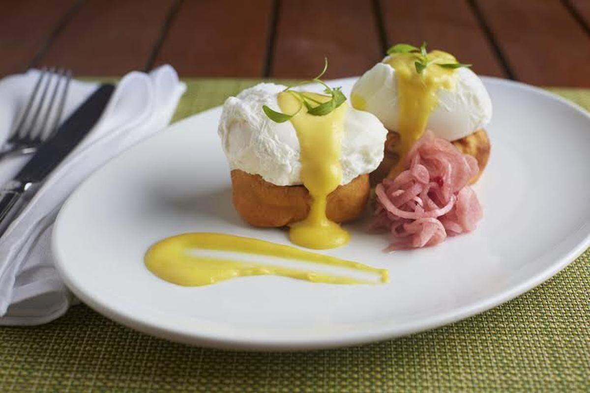 A Cuban-sandwich-inspired eggs Benedict is among the restaurant at The Raleigh's new menu.