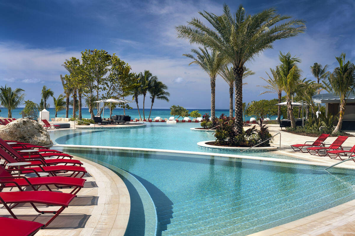 The Kimpton Seafire poolscape on Grand Cayman’s Seven Mile Beach.
