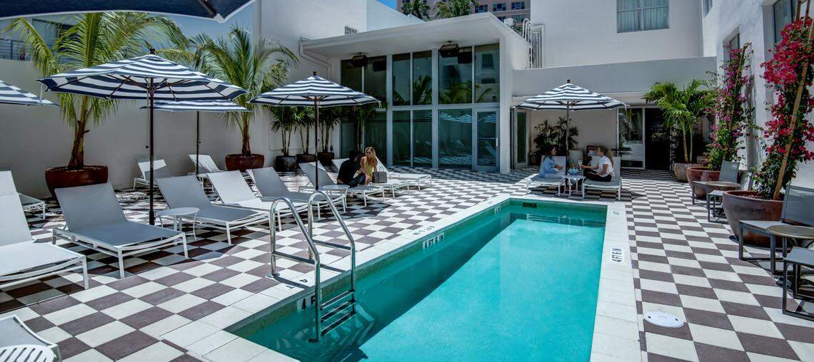 Check into the trendy Clinton Hotel on Washington Avenue.