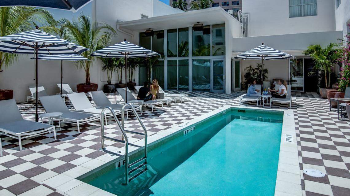 Check into the trendy Clinton Hotel on Washington Avenue.